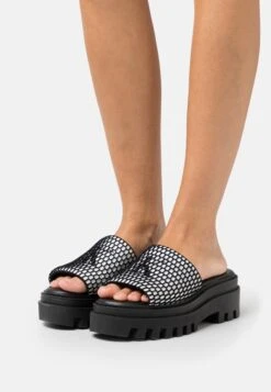 Calvin Klein Jeans Toothy Combat - Heeled Mules