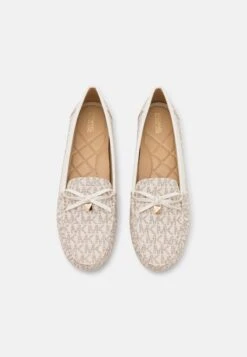 MICHAEL Michael Kors Juliette- Slip-Ons - Vanilla -Affordable Shoe Store c7e53224bf124749918ddf7de7492405