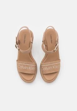 Calvin Klein Wedge- Platform Sandals - Safari 13 Calvin Klein Wedge- Platform Sandals - Safari -Affordable Shoe Store e5c29033ae974474ab25d627710c8458